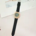 Orologio al quarzo alla moda con cinturino in silicone nero, lunetta strass oro rosa e quadrante verde. - Cinturino in Silicone Nero