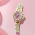 Fashion rhinestone quartz watch for women with floral bezel and sparkling crystal bracelet. - Gold Purple