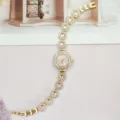 Elegante Damen Quarz Armbanduhr mit rosa Strass Blumen Design Luxus Gold Handgelenk Uhr - Gold Schwarz