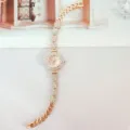 Rose gold rhinestone quartz watch for women, stylish floral link bracelet design, elegant gift. - Rose Gold