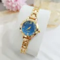 Montre quartz pour femme élégante avec bracelet en métal doré et cadran bleu chic. - Or Bleu