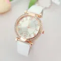 Elegant women rose gold quartz watch featuring a white leather strap and crystal rhinestone bezel - White
