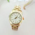 Luxury gold quartz watch featuring sparkling diamond markers and steel strap for daily. - Women / Gold White