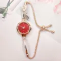 Elegant women quartz watch featuring red dial, sparkling rhinestone bow and adjustable bracelet chain. - Red