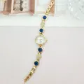Damen Quarz Uhr gold Armband Luxus Mode Strass blaue Steine lässig Armbanduhr Schmuck - Gold Blau