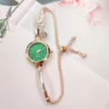 Elegant women quartz watch with green dial, rhinestone bow detail and rose gold chain strap. - Green