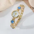 Luxus goldene Damen Quarzuhr mit blauen runden Steinakzenten und Diamantarmband. - Gold & Hellblau