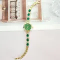 Modische Damen Quarzuhr mit grünen Strasssteinen und goldenem Armband Design für den Alltag. - Gold Grün