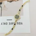 Damen Gold Quarz Armbanduhr mit Strasssteinen und schwarzen Stein Gliedern elegante Modeschmuck Uhr - Goldgehäuse Schwarz