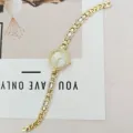 Elegante goldene Strass Damen Quarzurhr mit glitzerndem Kristall Armband für den Alltag. - Goldgehäuse Weißes Zifferblatt