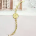 Damen Mode Strass Quarz Armbanduhr Luxus Gold Metall Charm Armbanduhr fuer Damen Stil - Gold