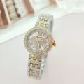 Detailed view of women rhinestone quartz watch with two-tone steel band and roman numerals. - Two Tone Gold Pink