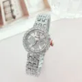 Close-up detail view of the sparkling rhinestone steel strap women quartz watch dial. - Silver Pink