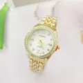 Orologio da polso al quarzo dorato in dettaglio, con lunetta in strass scintillante e cinturino. - Oro Bianco Donna