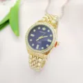 Orologio al quarzo in acciaio dorato di lusso con lunetta in strass e quadrante blu. - Oro Bleu Donna