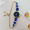 Schicke Herz Kristall Quarz Armbanduhr für Damen, elegantes goldene Kette Armband Design. - Gold Blau