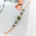 Damen Quarz Armbanduhr in Roségold mit grünen Kristallblumen und edlem Kettenarmband - Roségold Grün
