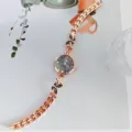 Roségold Damen Quarzuhr mit Kristall Schleife Armband Design, elegante Detailansicht. - Roségold Schwarz