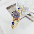 Elegant women's quartz watch with purple dial blue crystal gold bracelet style - Blue