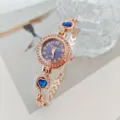 Elegante orologio da polso al quarzo da donna in oro rosa con strass e cuori blu per uso. - Oro Rosa Blu