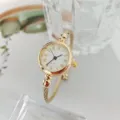 Reloj de pulsera de cuarzo dorado para mujer, reloj elegante y minimalista con esfera blanca. - Números Romanos / Dorado