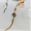 Elegante goldene Damen-Quarzuhr mit zartem Strass-Schmetterlings-Armband und feinem Design. - Gold Schwarz
