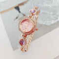 Orologio da donna al quarzo di lusso con quadrante rosa, lunetta strass e bracciale cuore. - Oro Rosa Viola