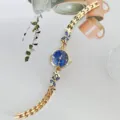 Elegante Damen Quarzuhr mit blauem Zifferblatt Kristall Schmetterling Armband Modedesign - Goldblau