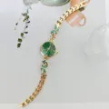 Damen Quarzuhr mit grünem Zifferblatt Strass Schmetterling Anhänger gold Armbanduhr Schmuck. - Gold Grün