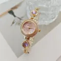 Orologio da donna al quarzo con strass dorati quadrante rosa e bracciale a cuore viola. - Oro Viola