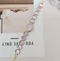 Luxus lila Kristall Armbanduhr mit Quarzwerk für Damen, elegante quadratische Modeuhr. - Lila