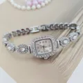 Elegante silberne Strass-Quartzuhr für Damen mit funkelndem Kristall-Armband-Design. - Silber Weiß