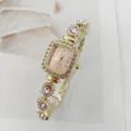 Elegante quadratische Damenuhr mit Quarzwerk, rosa Zifferblatt und funkelndem Strassarmband. - Rosa