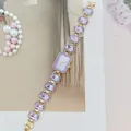 Elegant purple crystal quartz watch for women with gold-tone rectangular linked chain bracelet. - Gold Purple
