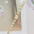 Elegant women quartz watch with crystal rhinestone link strap luxury fashion timepiece. - Gold