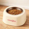 Pet bowl with stainless steel inner bowl and beige outer shell, ideal for dogs and cats. - Food Bowl / Beige