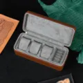 Brown leather watch storage box with three slots and grey velvet interior for travel. - 3-Slot with Ring Pillow / Dark Brown