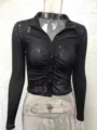 Black sheer long sleeve button down crop top detail showing collar and fabric texture. - S / Tops / Black