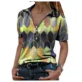 Detailed view of women short sleeve V-neck zip t-shirt showcasing colorful geometric pattern top. - S / Yellow