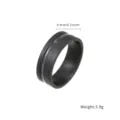 Gros plan détaillé de la bague en titane noir minimaliste, largeur 0,8 cm, poids 3,9 g. - Style Rainuré Minimaliste (TIR2425-BL-P)