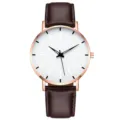 Minimalist quartz watch for men featuring rose gold case white dial and brown leather strap. - Rose Gold White Dial Brown Strap