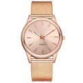 Rose gold quartz watch for women and men featuring minimalist dial and metal mesh strap. - Rose Gold