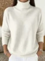 Solid color casual knitted turtleneck pullover sweater for women, comfortable daily wear detail. - White