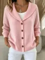 Close-up of women pink knit cardigan with shawl collar and brown buttons detail style. - S / Tops / Pink