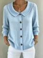 Close-up detail view of the light blue knit cardigan featuring a shawl collar and buttons. - S / Tops / Sky Blue