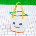 Bolsa de playa transparente de PVC con asas amarillas y diseño de cara de dibujos animados. - Talla Única / Linda carita sonriente