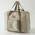 Grosse Reise-Tasche in Khaki, wasserdichtes Material mit Kofferriemen und praktischer Vordertasche. - L / Khaki