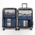 Portable travel packing cubes set in blue for suitcase organizing and luggage storage. - Navy Blue