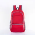Mochila de viaje ligera y plegable roja con bolsillos laterales de malla para deportes y senderismo. - Talla Única / Rojo