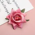 Artificial pink silk rose flower head, detailed view of floral craft for wedding decor DIY. - Pink Gradient